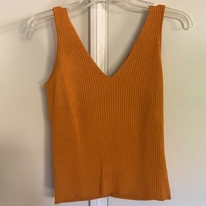 Orange knit tank. Small. Good used condition. Halloween/Fall. Pumpkin shade